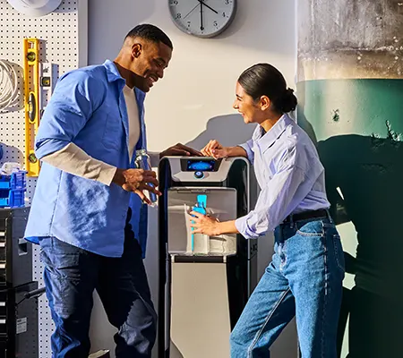 Office team using water cooler
