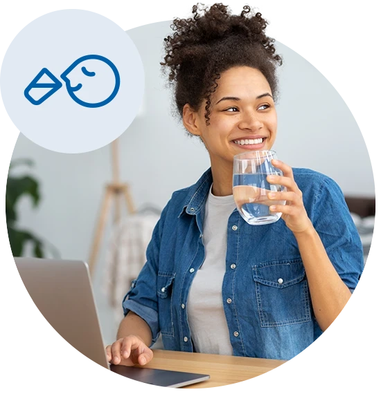 Woman holding a glass of water