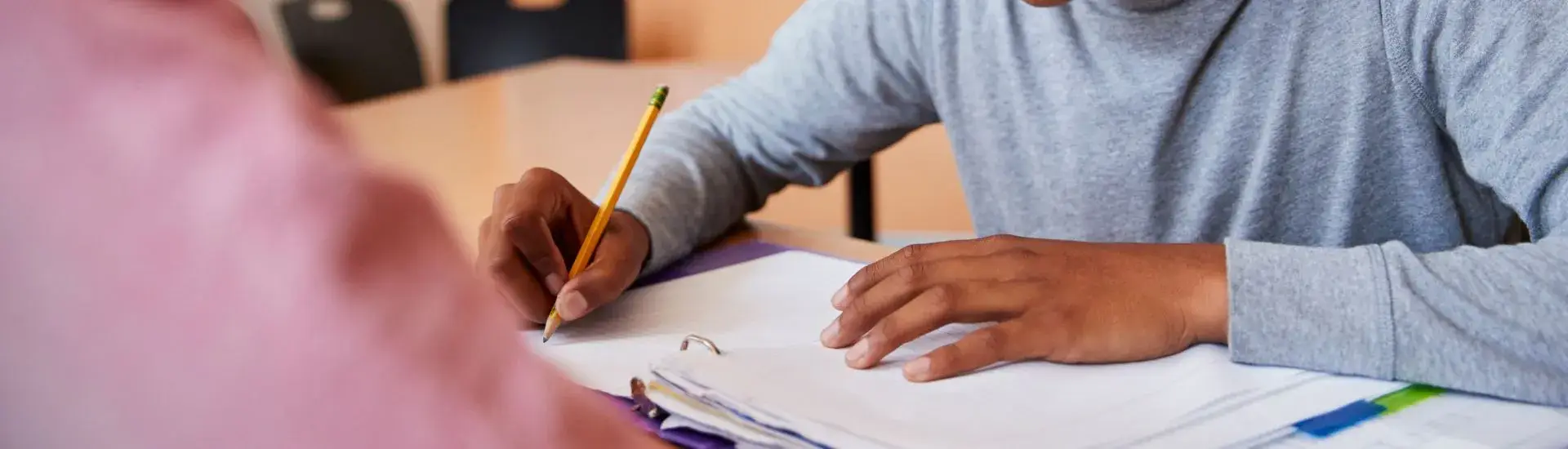 child working at school desk